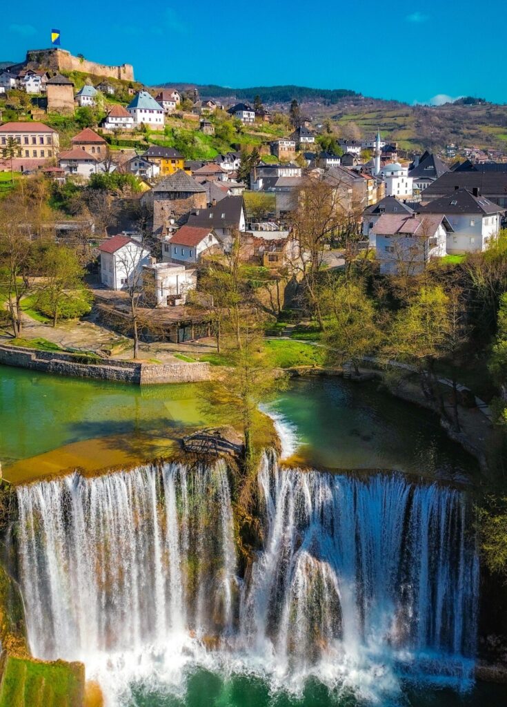 A picturesque town of Jajce with historic architecture and the stunning Pliva Waterfall in Bosnia and Herzegovina.