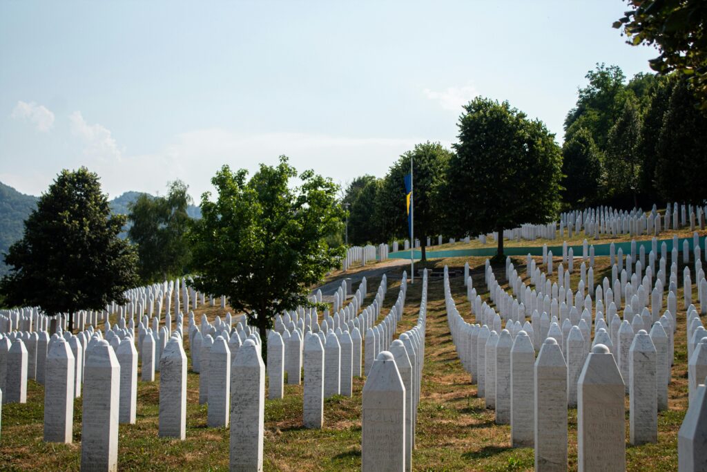 pexels-photo-32933059-32933059 White gravestones at Srebrenica Memorial Cemetery, symbolizing remembrance and history.