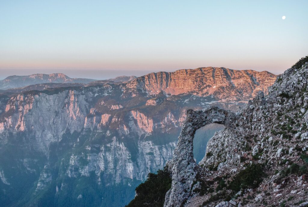 pexels-photo-13353114-13353114 Scenic view of the rocky arch and cliffs of Čvrsnica Mountain in Bosnia and Herzegovina.